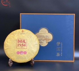 Trà phổ nhĩ sống Thất Thái Khổng Tước Quốc Lễ 1950 cao cấp 357gr PNS09
